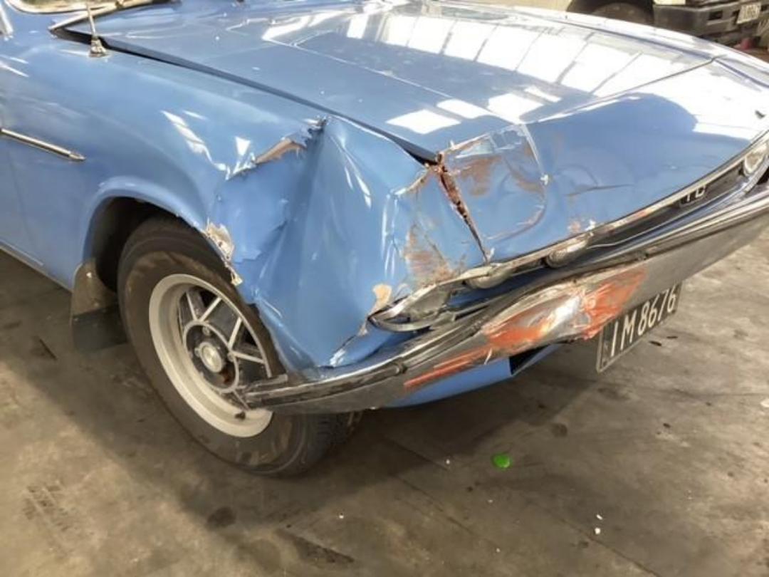 Damaged Triumph 2500 TC 1977 in Wellington Seaview at Turners