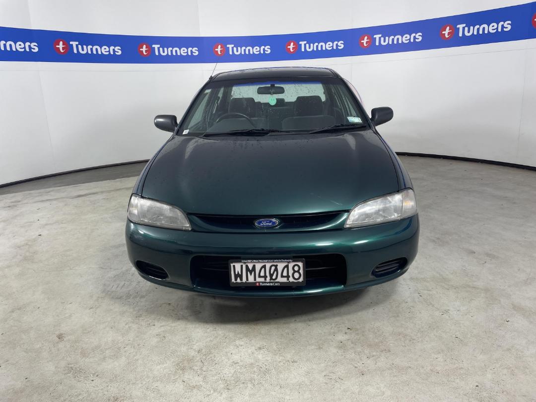 Damaged Ford Laser Glxi 1997 in North Shore at Turners Damaged and