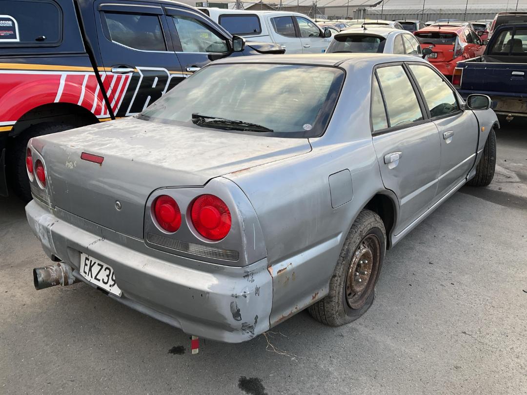Damaged Nissan Skyline 1999 in Wellington Seaview at Turners