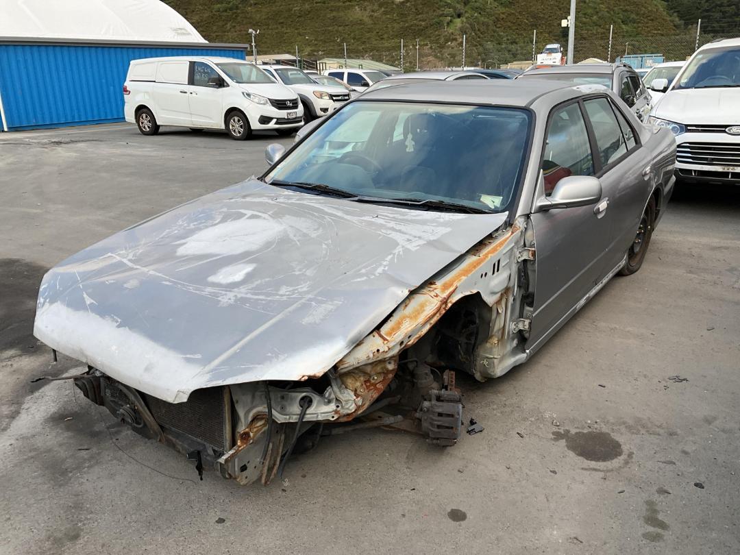 Damaged Nissan Skyline 1999 in Wellington Seaview at Turners