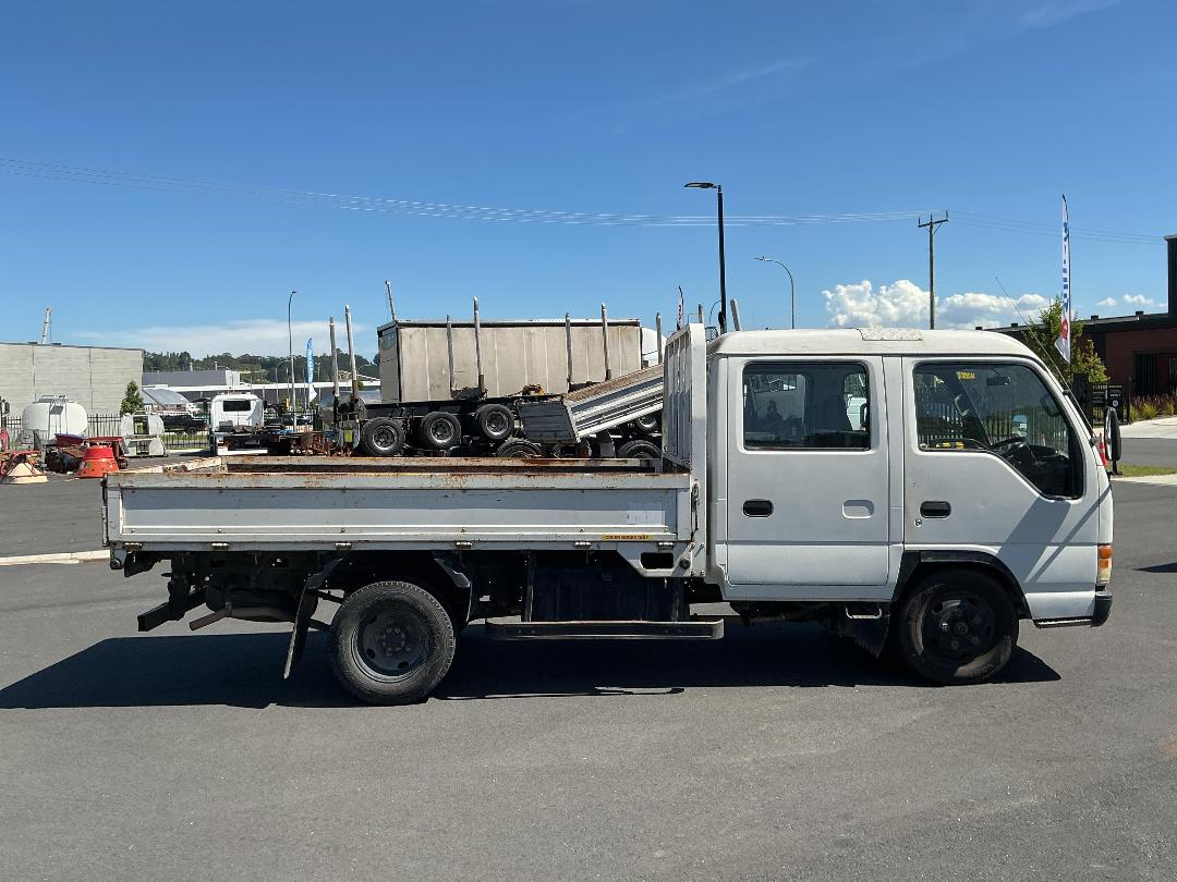Photo '3' of Isuzu ELF NKR66 Double Cab - Flat Deck Photo '3' of Isuzu ELF NKR66 Double Cab - Flat Deck