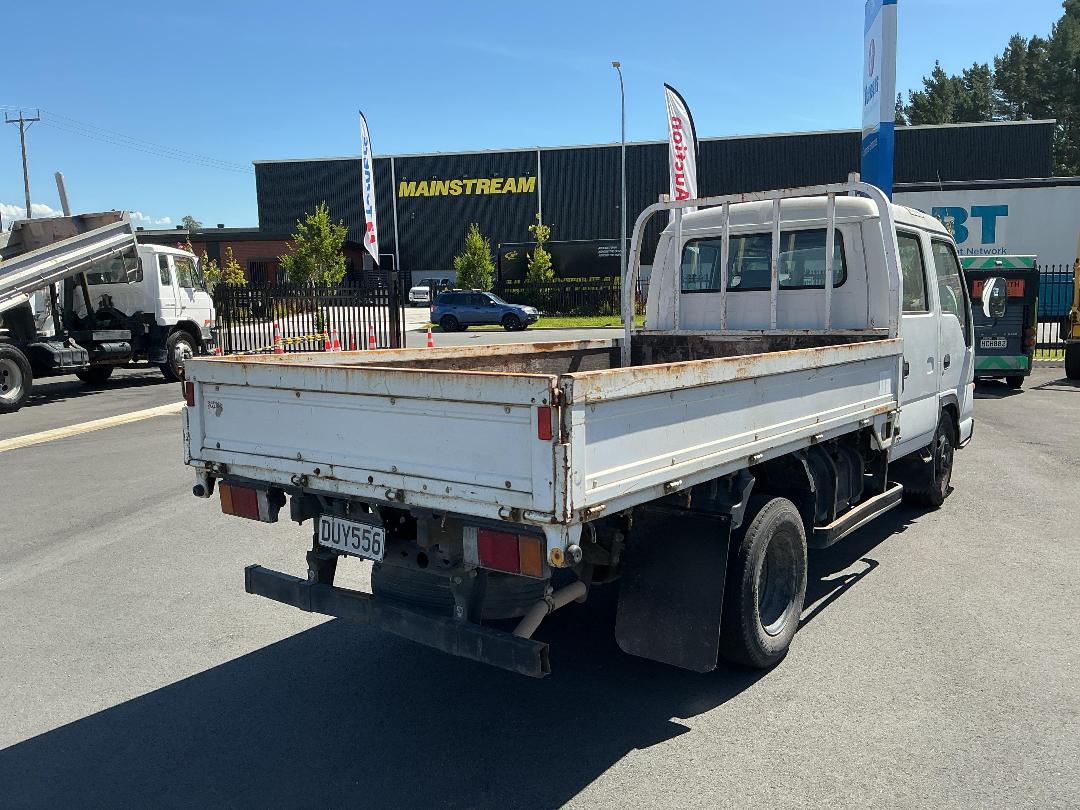 Photo '4' of Isuzu ELF NKR66 Double Cab - Flat Deck Photo '4' of Isuzu ELF NKR66 Double Cab - Flat Deck