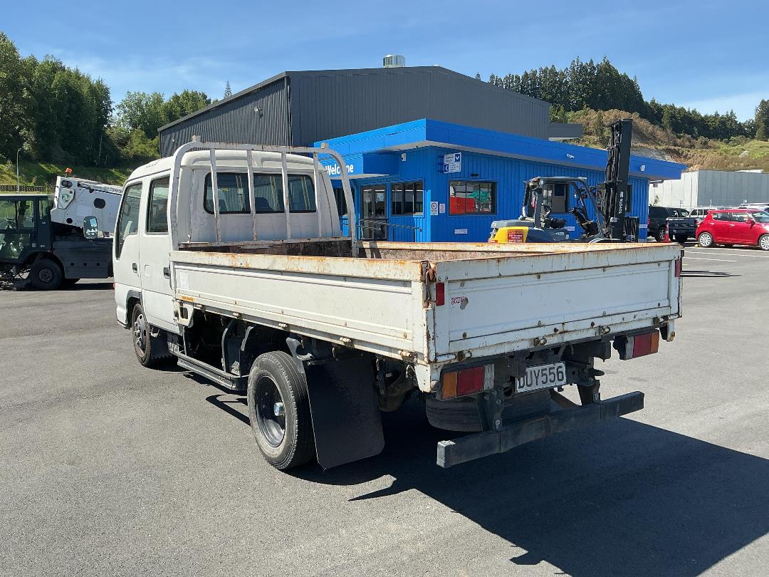 Photo '6' of Isuzu ELF NKR66 Double Cab - Flat Deck Photo '6' of Isuzu ELF NKR66 Double Cab - Flat Deck