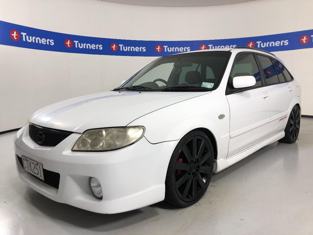 Photo '4' of Mazda Familia Photo '4' of Mazda Familia