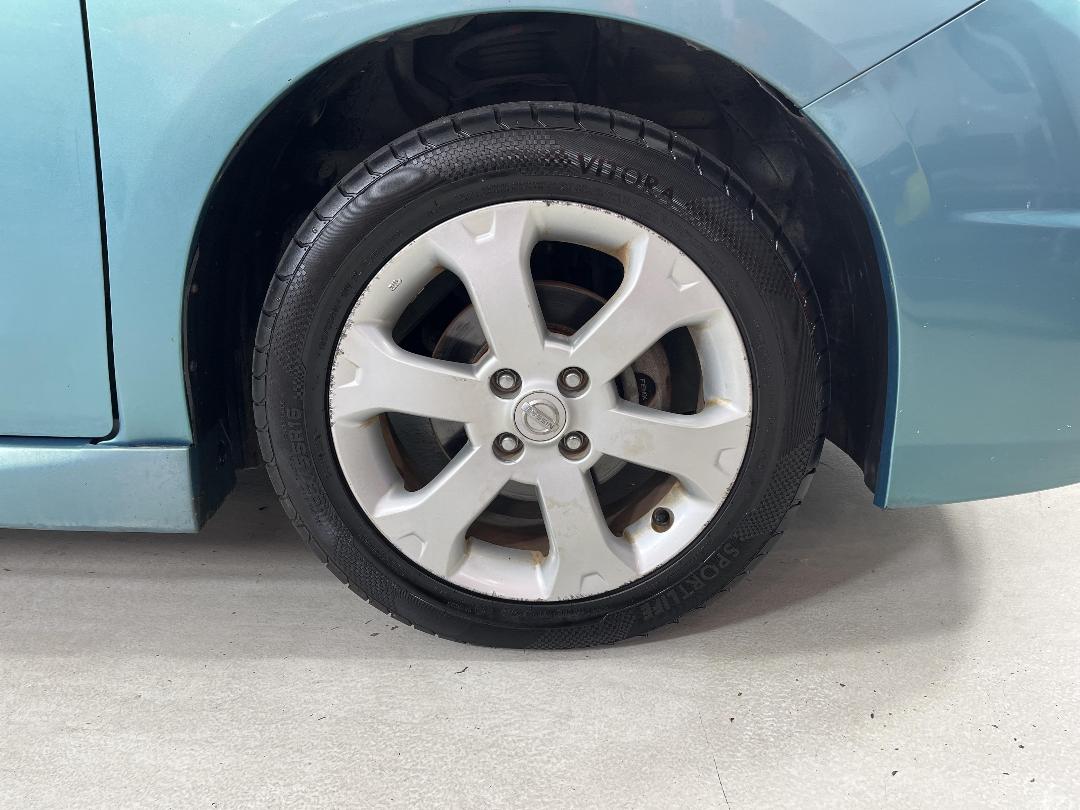 Photo '9' of Nissan Wingroad Photo '9' of Nissan Wingroad