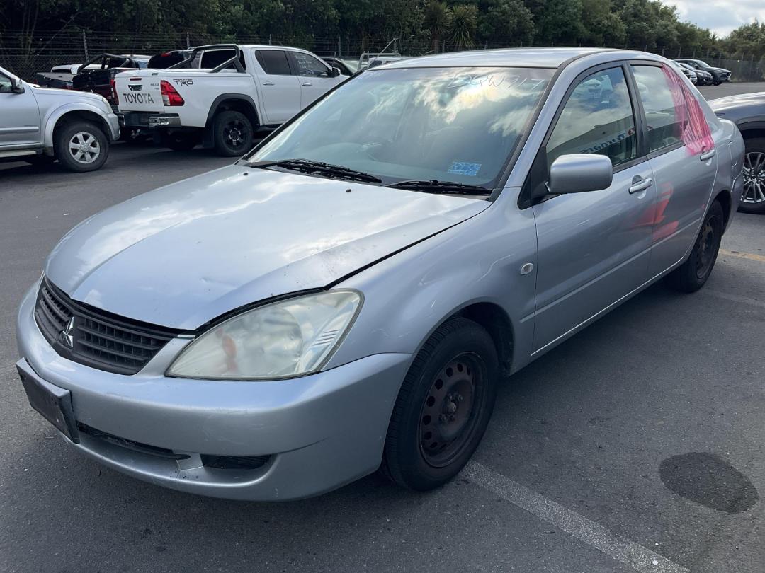 Damaged Mitsubishi Lancer 2006 in Wiri at Turners Damaged and End Of