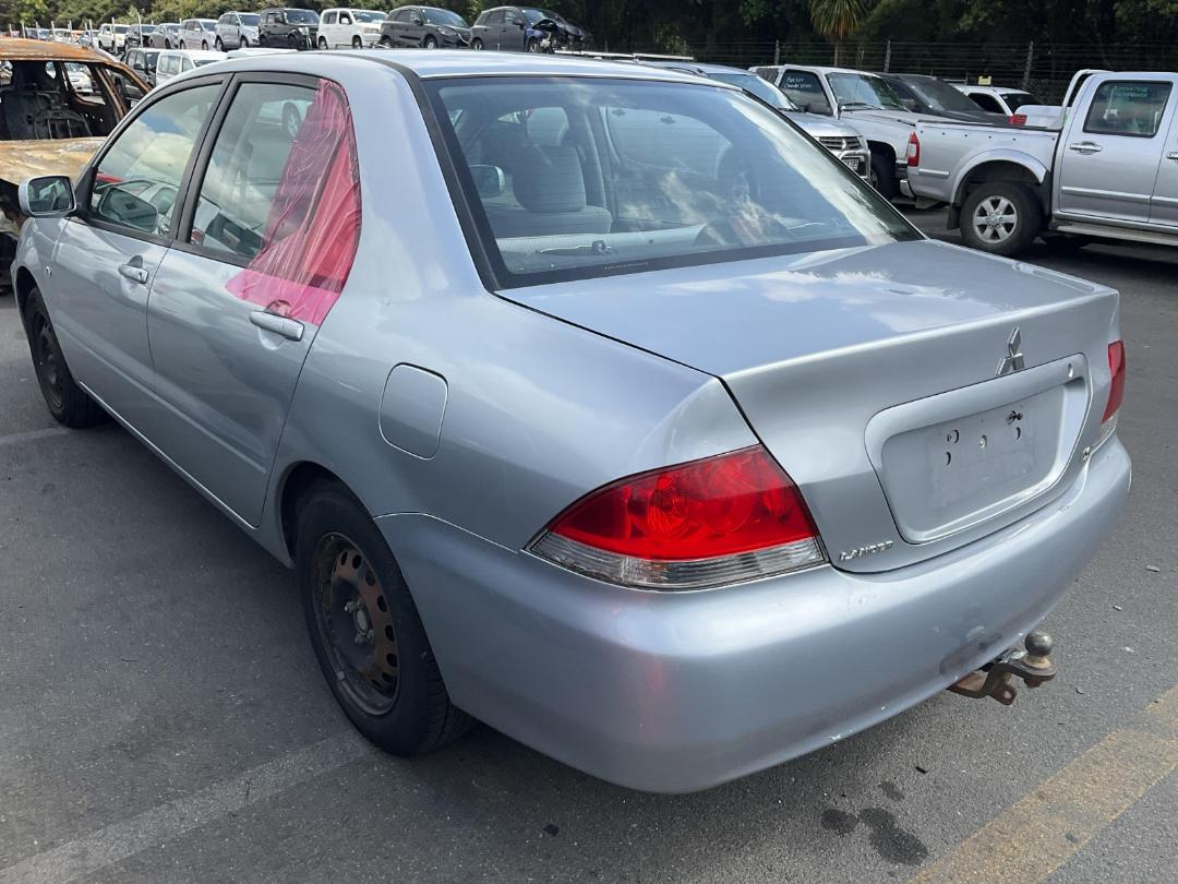 Damaged Mitsubishi Lancer 2006 in Wiri at Turners Damaged and End Of