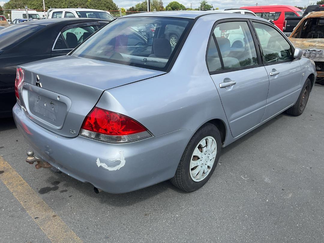 Damaged Mitsubishi Lancer 2006 in Wiri at Turners Damaged and End Of