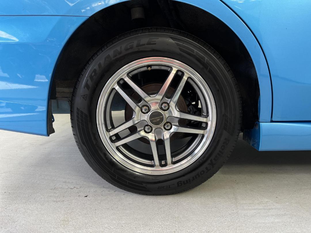 Photo '12' of Nissan Wingroad Photo '12' of Nissan Wingroad