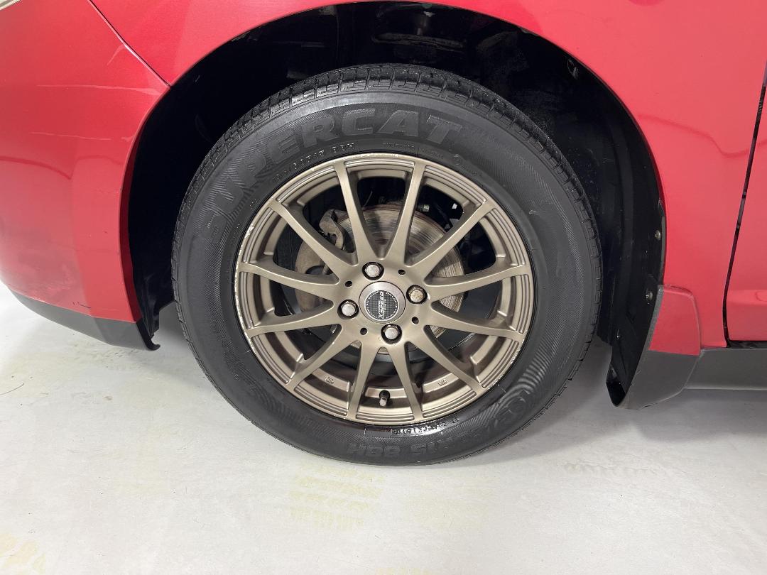 Photo '10' of Nissan Tiida Photo '10' of Nissan Tiida