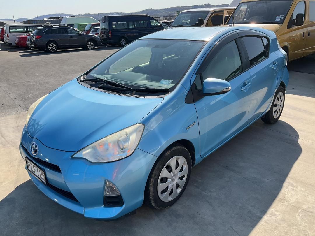 Damaged Toyota Aqua Hybrid 2013 in Wellington Seaview at Turners
