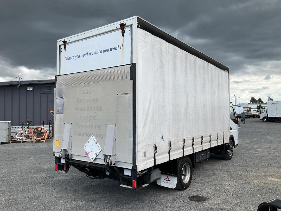Photo '4' of Mitsubishi Fuso Canter HEV75G2 EURO5 HYBRID Curtainsider