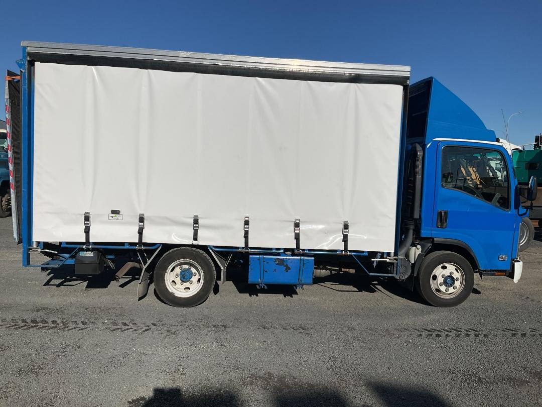 Photo '3' of Isuzu N Series NPR325M AMT Curtainsider Photo '3' of Isuzu N Series NPR325M AMT Curtainsider