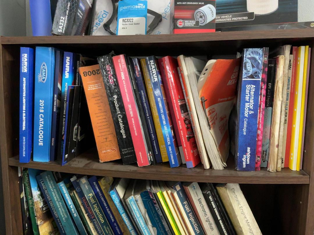 Photo '3' of Shelf of Auto Sparky books, and Filters Photo '3' of Shelf of Auto Sparky books, and Filters