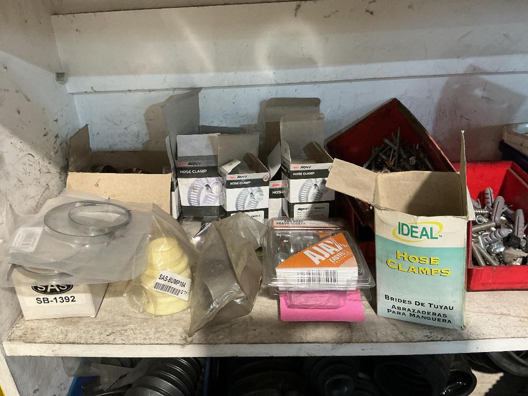 Photo '5' of Assorted shelf of CV Boots, light bulbs, hose clamps etc