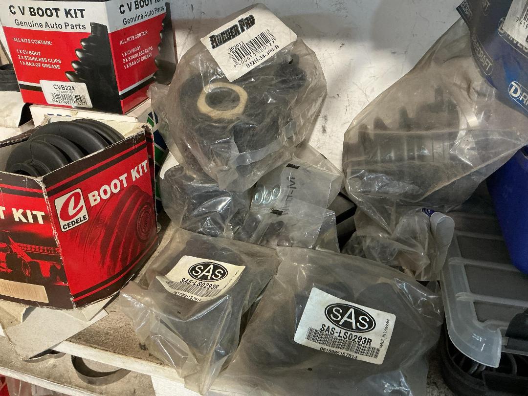 Photo '8' of Assorted shelf of CV Boots, light bulbs, hose clamps etc