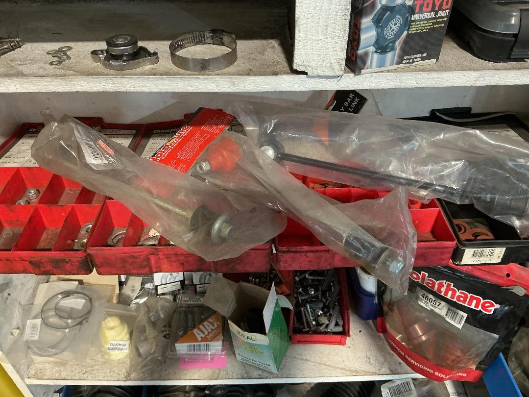 Photo '7' of Assorted shelf of CV Boots, light bulbs, hose clamps etc