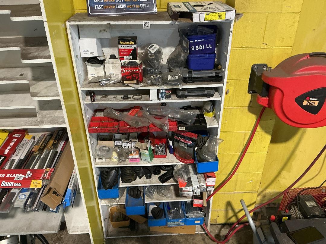 Photo '11' of Assorted shelf of CV Boots, light bulbs, hose clamps etc