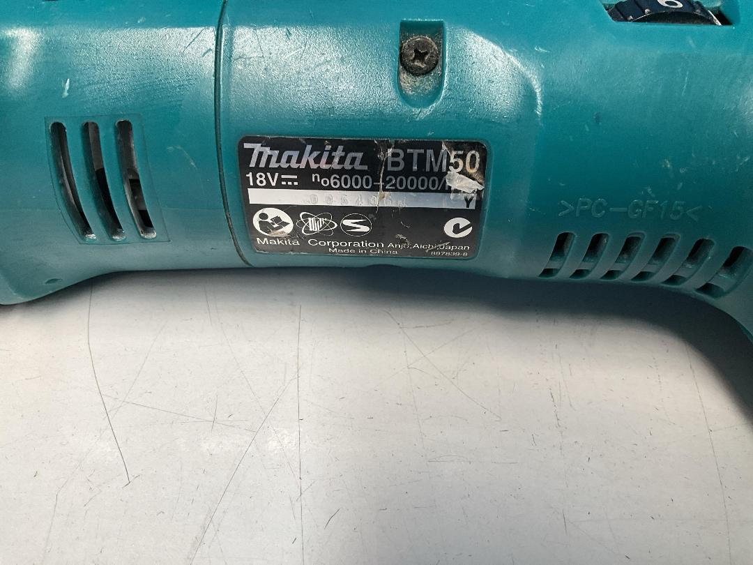 Photo '2' of Makita Multi Tool ( parts only) - Model BTM50  - Skin Only
