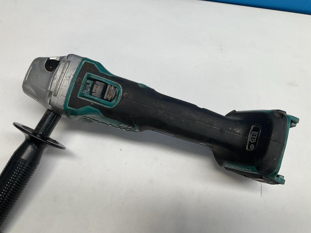 Photo '5' of Makita - 18V Brushless 125mm Slide Switch Angle Grinder (Skin Only)