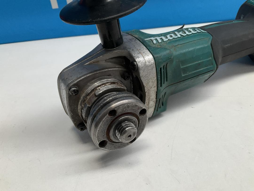 Photo '6' of Makita - 18V Brushless 125mm Slide Switch Angle Grinder (Skin Only)