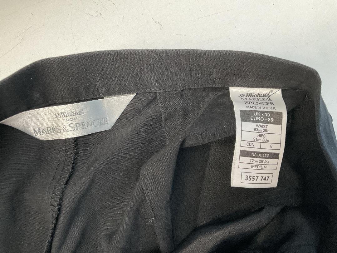 Photo '11' of Assortment of Women’s Clothes and Some Coat Hangers