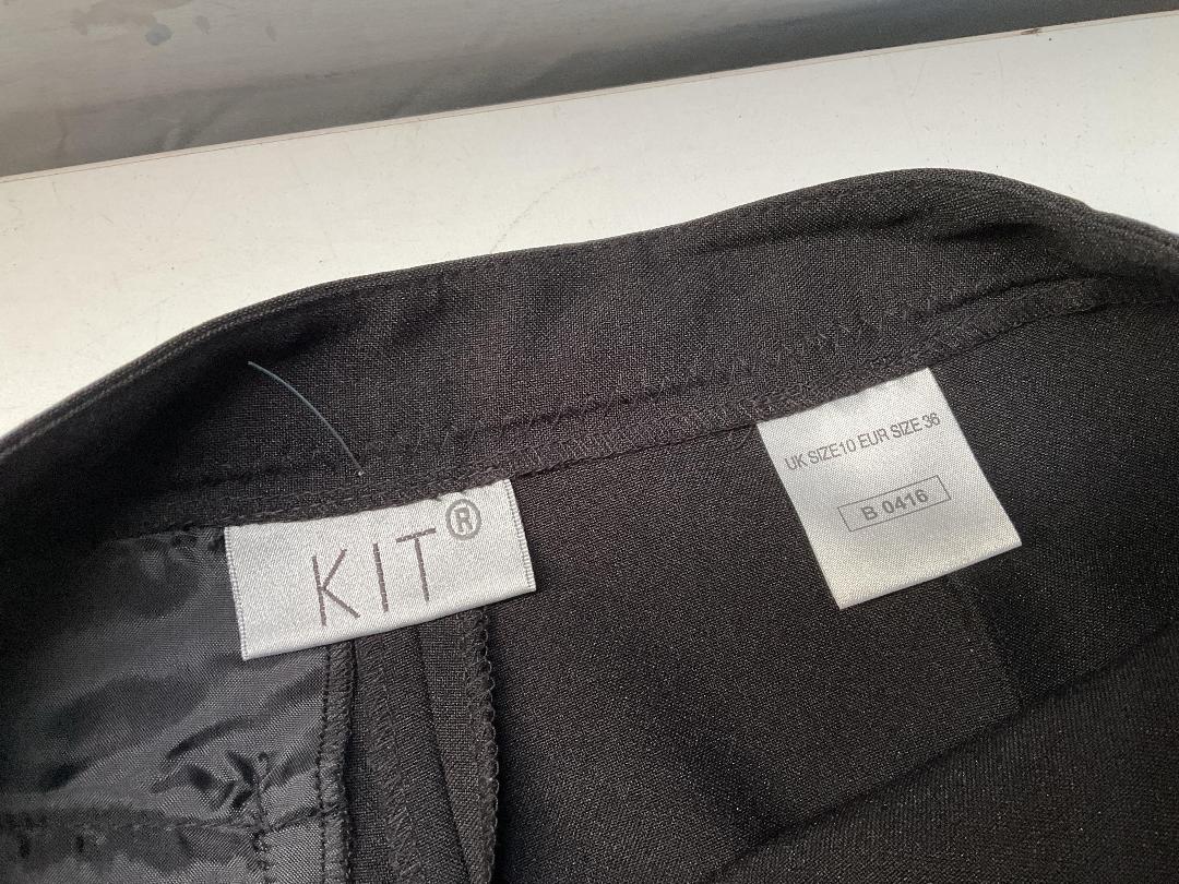 Photo '9' of Assortment of Women’s Clothes and Some Coat Hangers