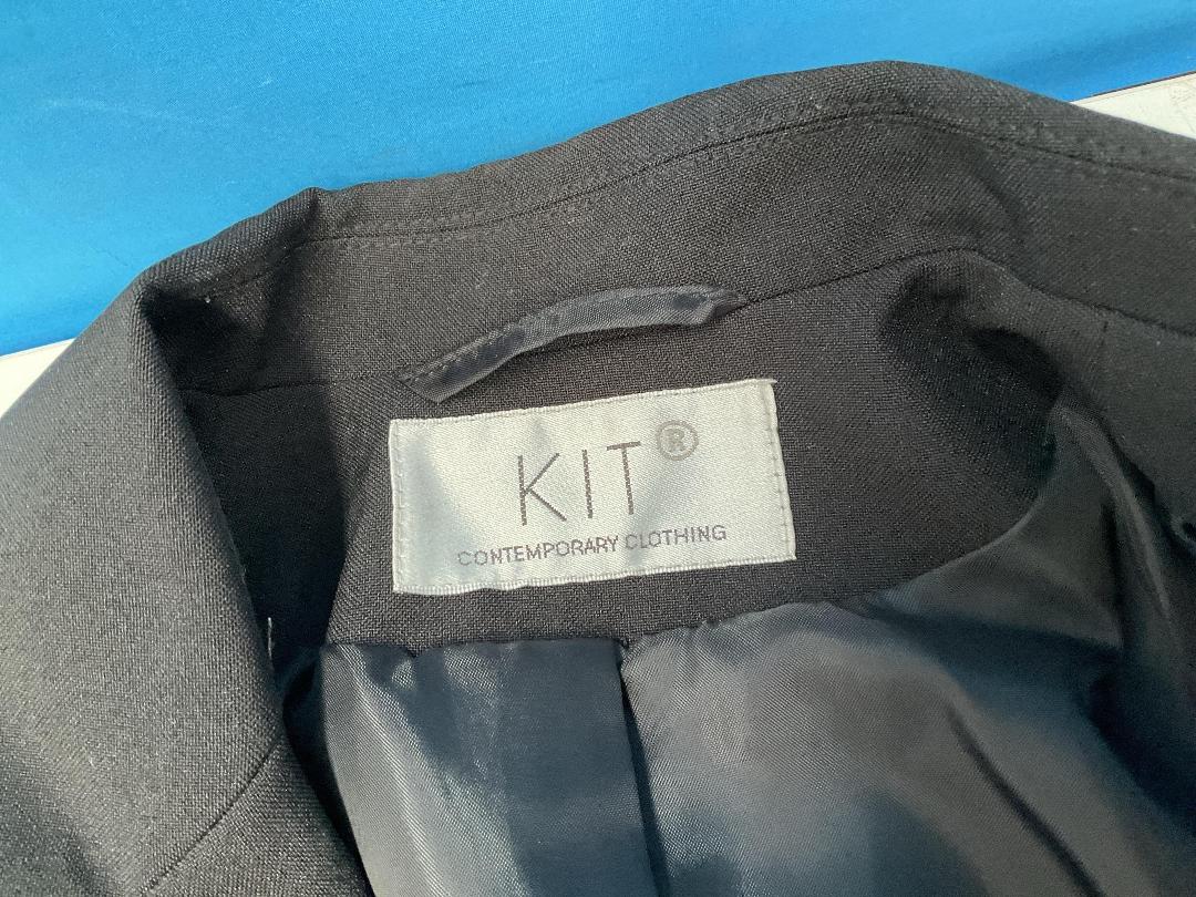 Photo '13' of Assortment of Women’s Clothes and Some Coat Hangers