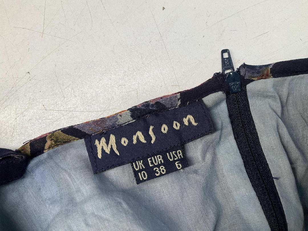 Photo '16' of Assortment of Women’s Clothes and Some Coat Hangers