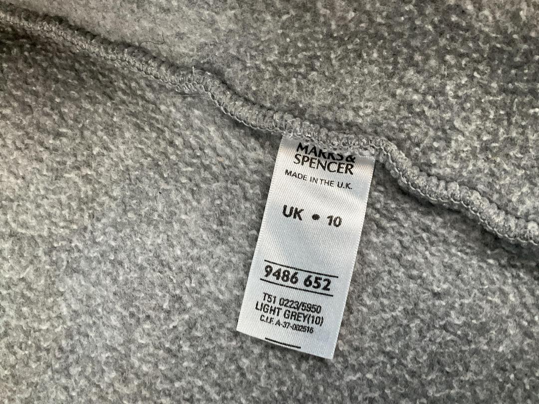 Photo '21' of Assortment of Women’s Clothes and Some Coat Hangers