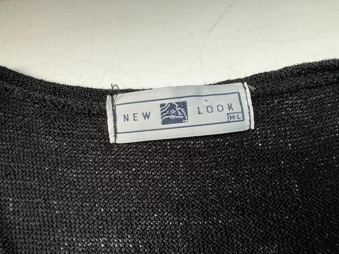 Photo '26' of Assortment of Women’s Clothes and Some Coat Hangers