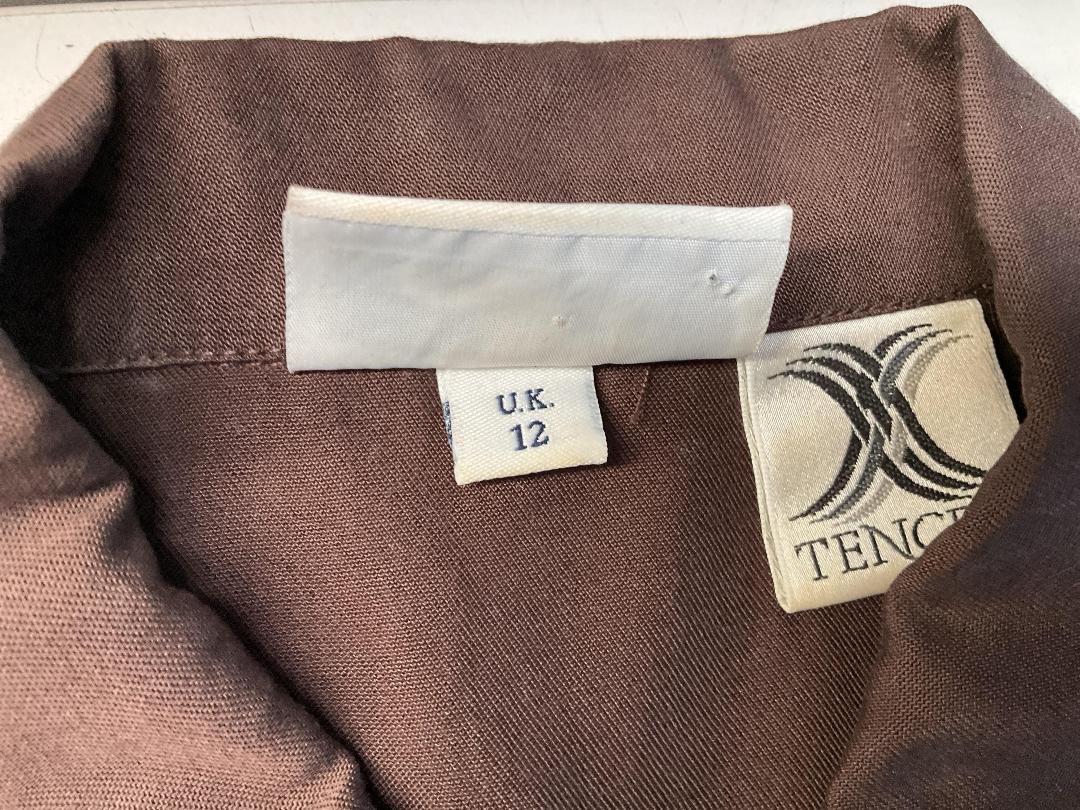 Photo '31' of Assortment of Women’s Clothes and Some Coat Hangers