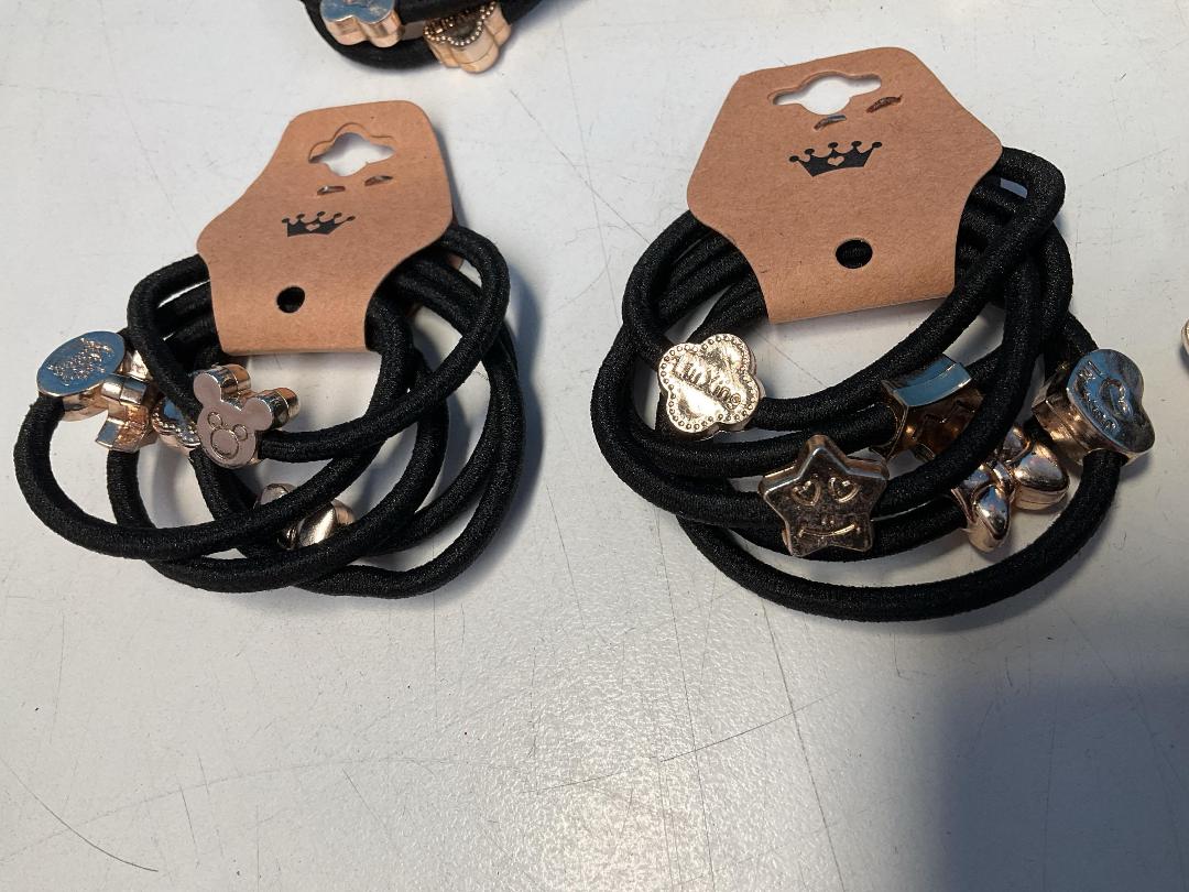 Photo '4' of 10x Packs of Black Coloured Hair Ties with Gold Coloured Designs *NEW*