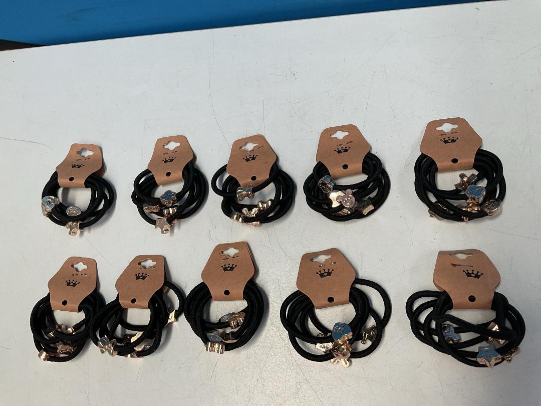 Photo '6' of 10x Packs of Black Coloured Hair Ties with Gold Coloured Designs *NEW*