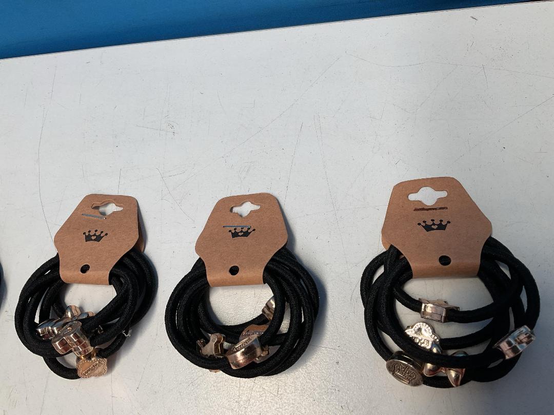 Photo '3' of 10x Packs of Black Coloured Hair Ties with Gold Coloured Designs *NEW*