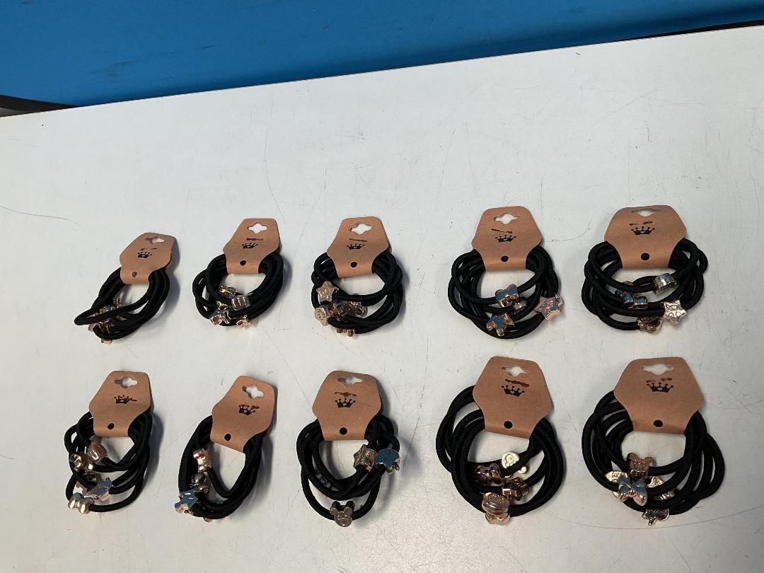 Photo '6' of 10x Packs of Black Coloured Hair Ties with Gold Coloured Designs *NEW*