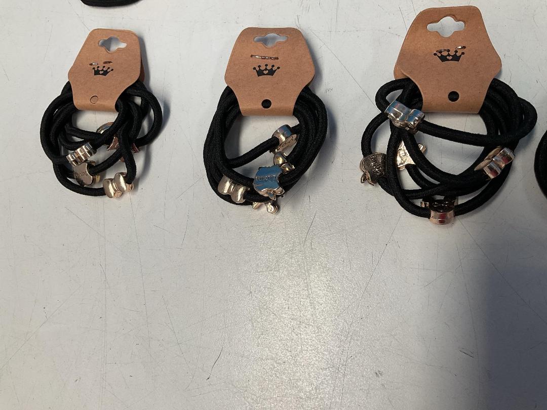 Photo '4' of 10x Packs of Black Coloured Hair Ties with Gold Coloured Designs *NEW*