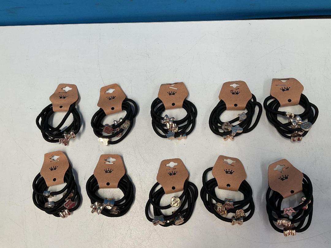 Photo '6' of 10x Packs of Black Coloured Hair Ties with Gold Coloured Designs *NEW*