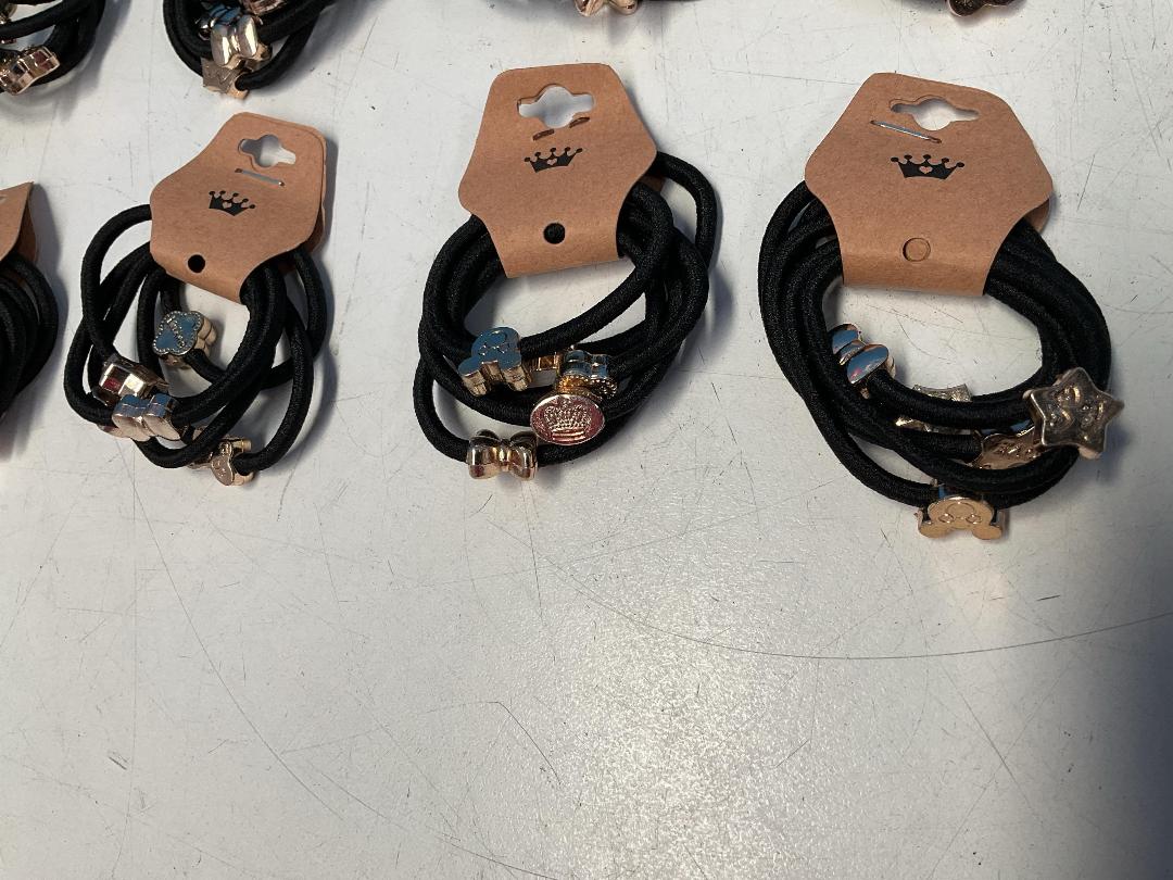 Photo '5' of 10x Packs of Black Coloured Hair Ties with Gold Coloured Designs *NEW*