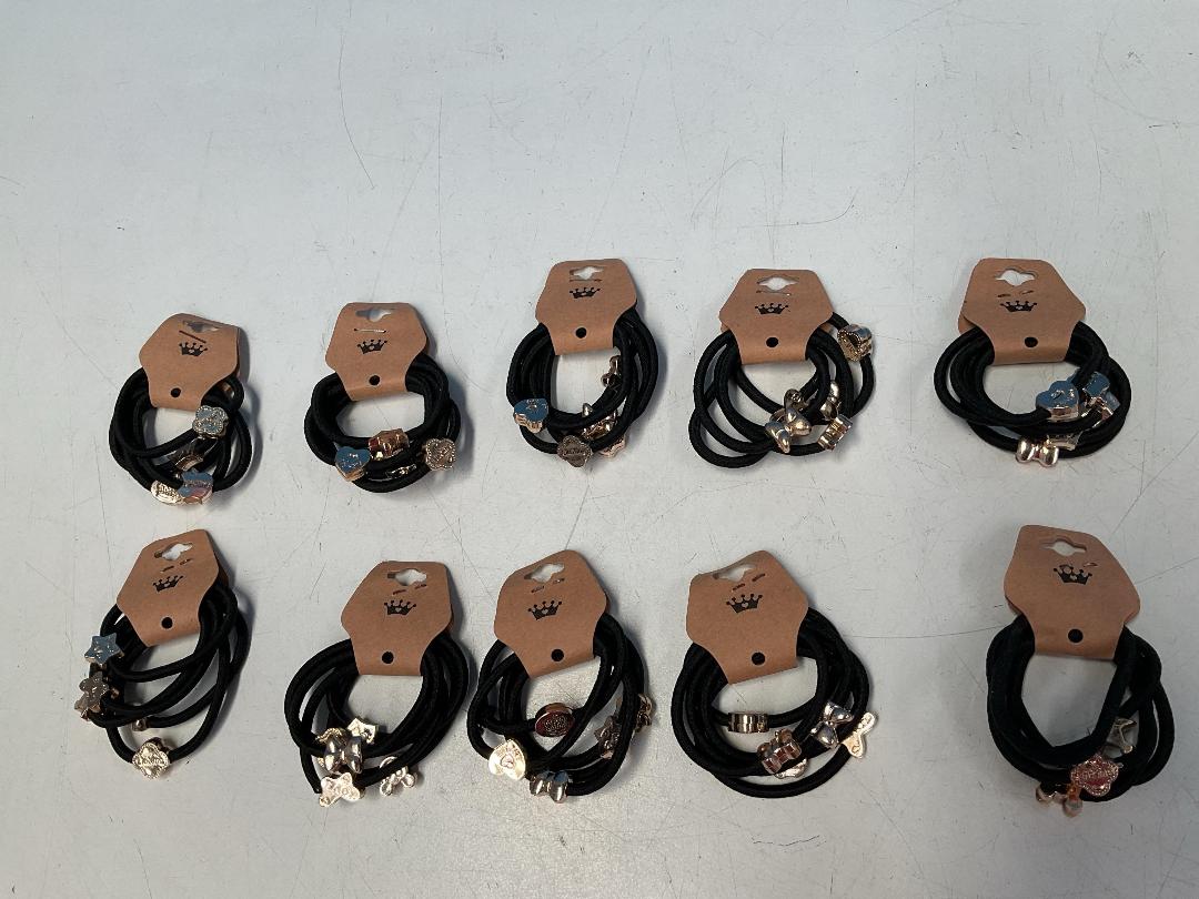 Photo '6' of 10x Packs of Black Coloured Hair Ties with Gold Coloured Designs *NEW*
