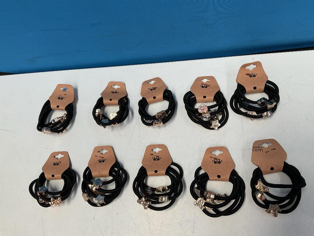 Photo '6' of 10x Packs of Black Coloured Hair Ties with Gold Coloured Designs *NEW*