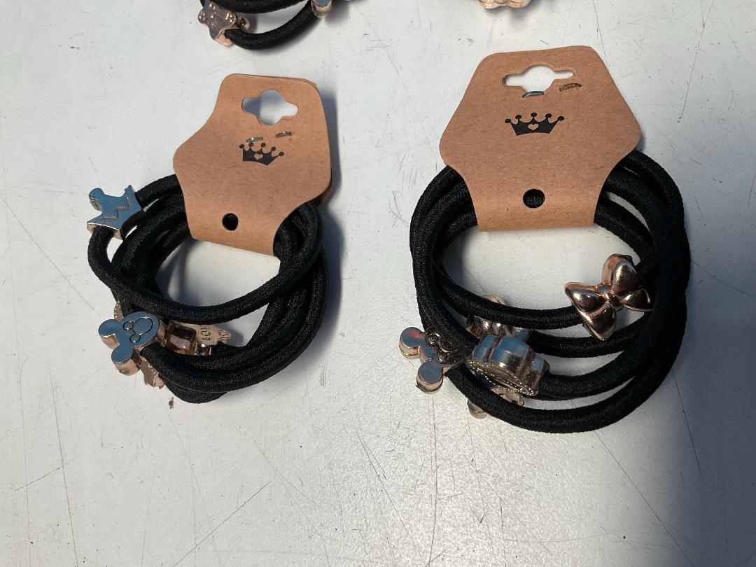 Photo '4' of 10x Packs of Black Coloured Hair Ties with Gold Coloured Designs *NEW*