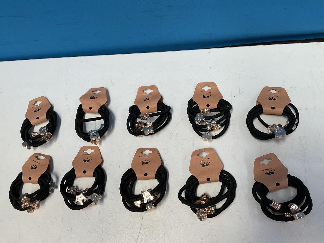 Photo '6' of 10x Packs of Black Coloured Hair Ties with Gold Coloured Designs *NEW*