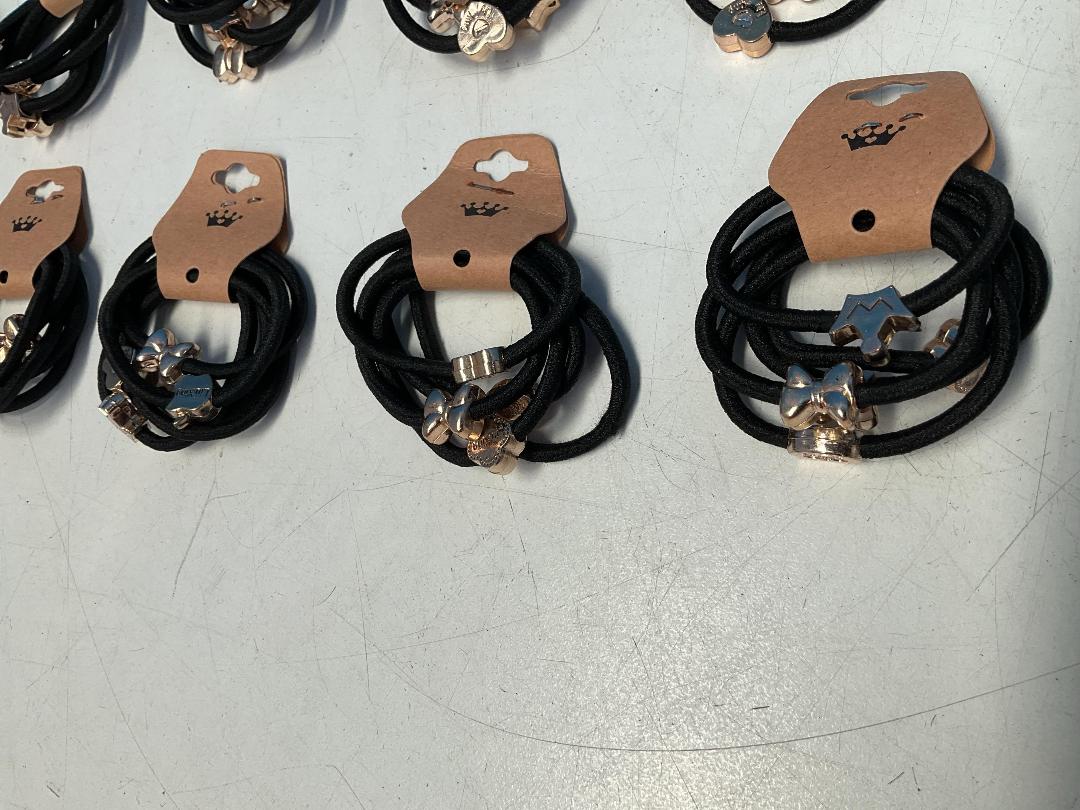Photo '5' of 10x Packs of Black Coloured Hair Ties with Gold Coloured Designs *NEW*