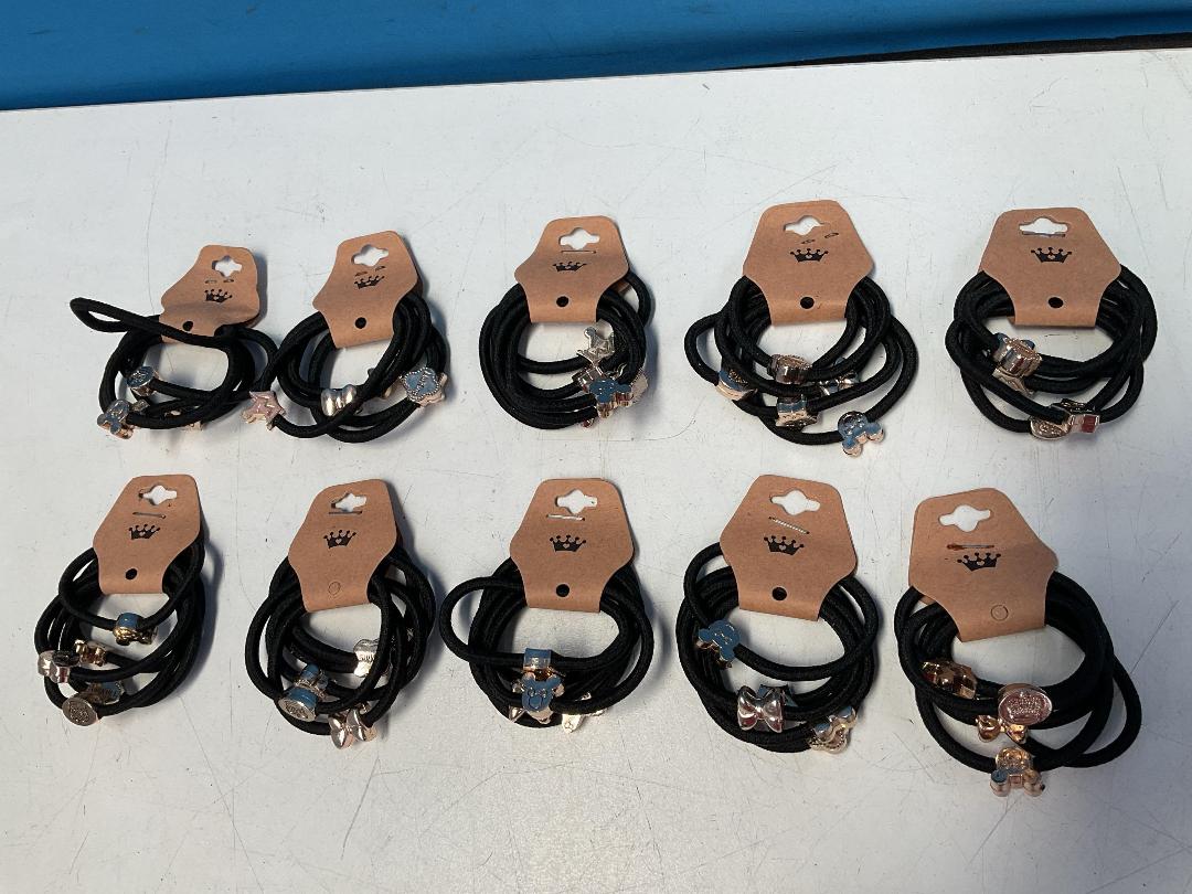 Photo '6' of 10x Packs of Black Coloured Hair Ties with Gold Coloured Designs *NEW*