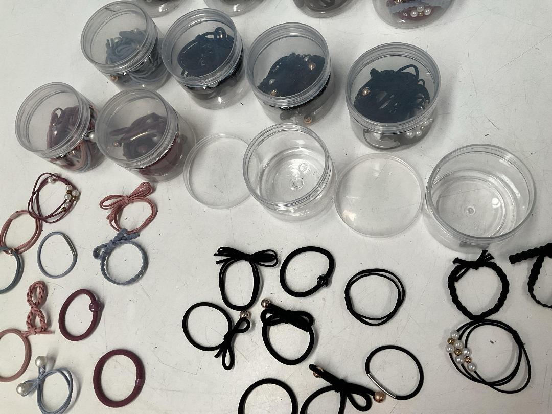 Photo '4' of 16x Small Round Containers of Various Coloured Hair Ties *New*