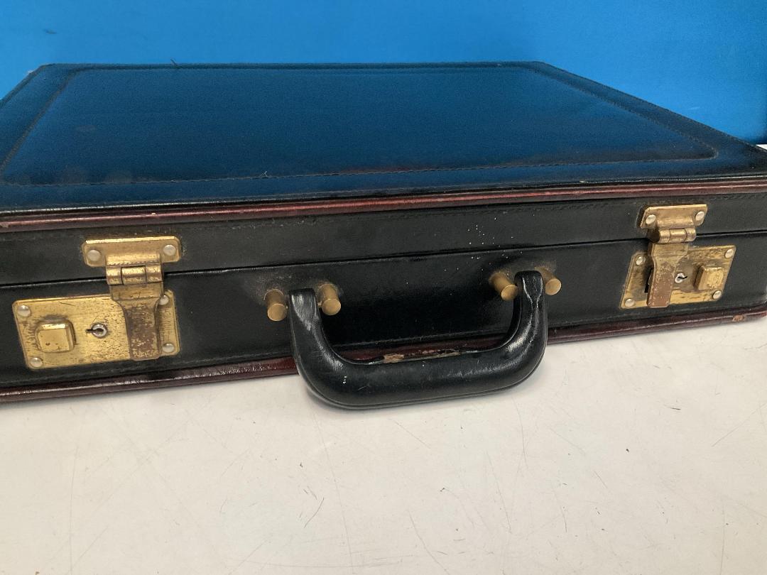 Photo '3' of Escale Suitcase on Wheels and a Black Coloured Briefcase