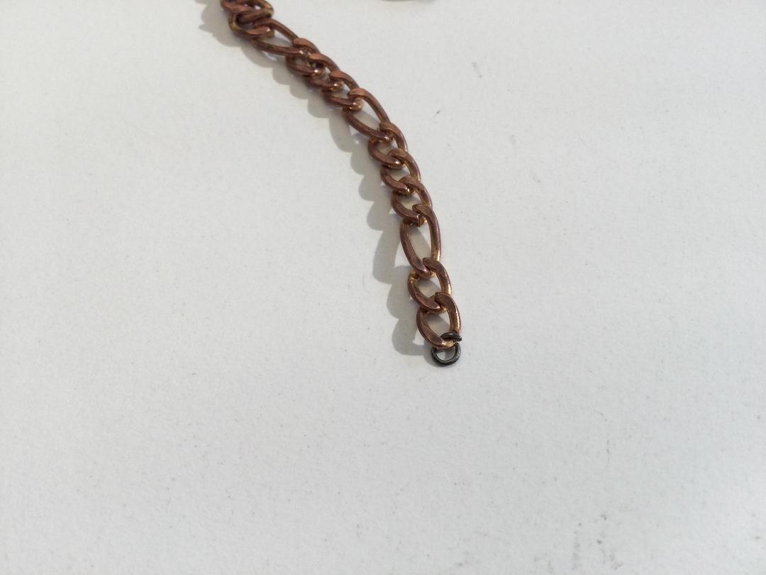 Photo '3' of Broken bronze coloured bracelet