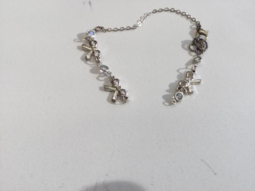 Photo '2' of Broken silver coloured bracelet