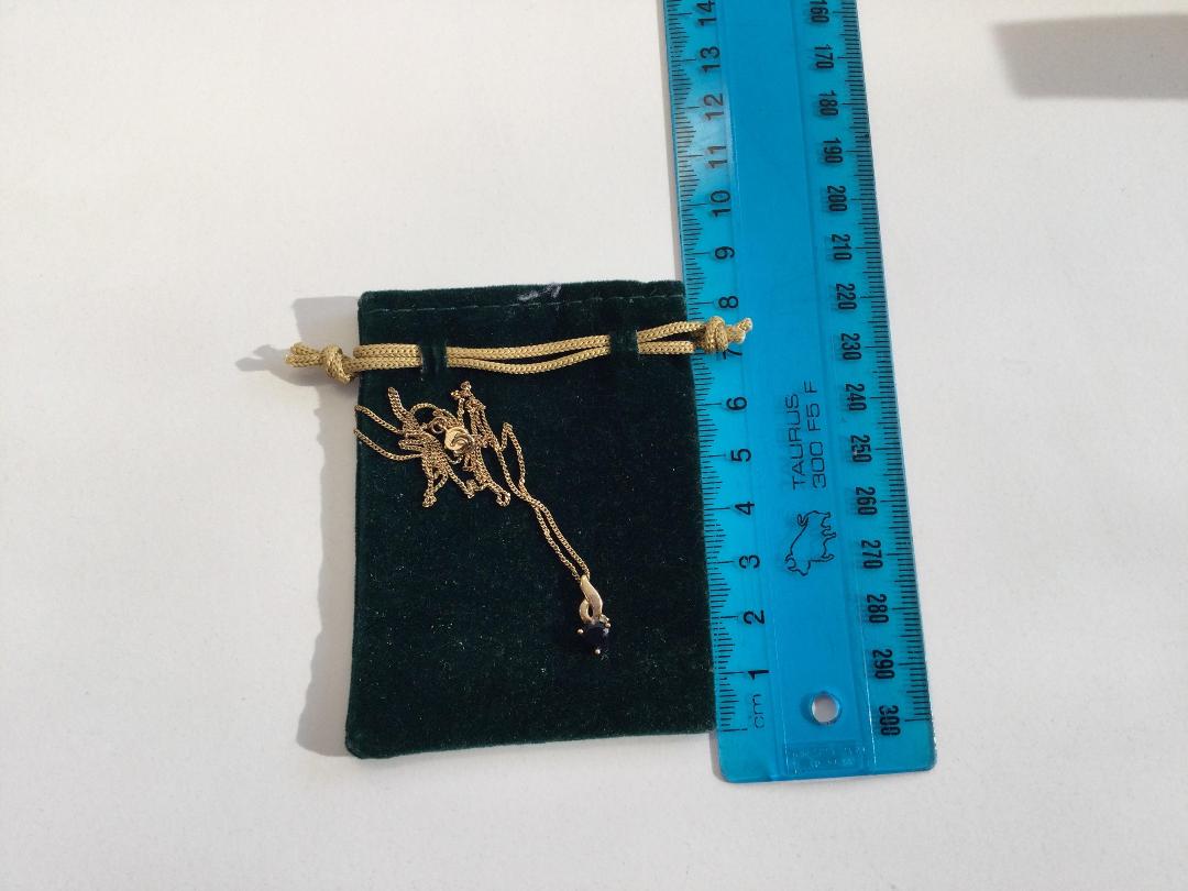 Photo '4' of Gold coloured chain with blue coloured heart pendant